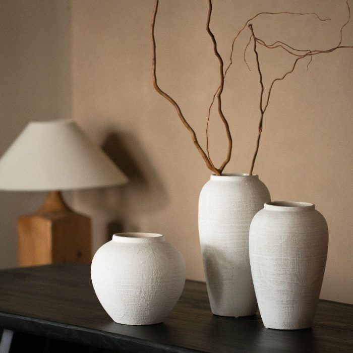 white nordic ceramic vases on table